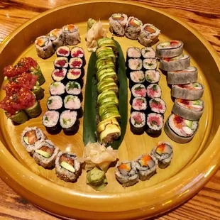 Matteo, spicy tuna, 2 yellowtail rolls, toro, special eel, salmon avocado, scallop, and rainbow rolls