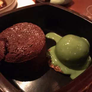 Chocolate cake with green tea ice cream