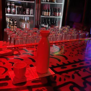 a bar with red lights