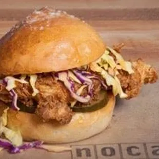 What the Cluck?: Fried Chicken Breast, Slaw, B&amp;B Pickles, and Honey Dijon served on a Park House Roll