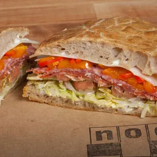 Italian Stallion: Italian Salumi, Provolone, Lettuce, Red Onion, Peppers, Tomato, Aioli, Oregano, Vinegar &amp; EVOO served on Focaccia