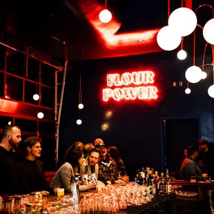 people sitting at the bar