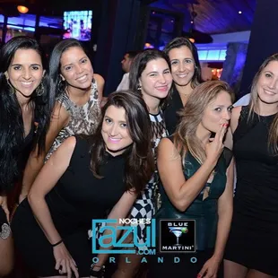 a group of women posing for a picture