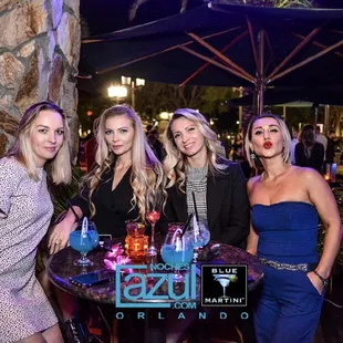 a group of women posing for a picture