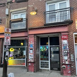 the front of a brick building