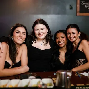 Friends having fun at karaoke bar