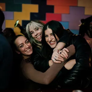 Friends having fun at karaoke bar