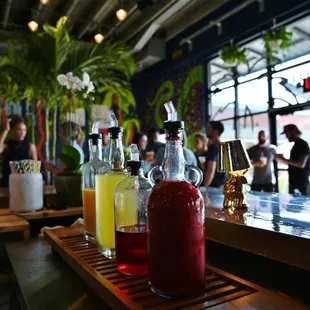 a variety of drinks on the bar
