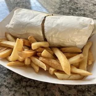 a burrito and french fries