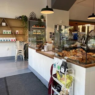 a counter with a variety of baked goods
