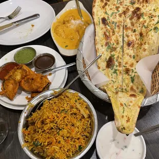Lamb Biryani, Eggplant Pakora, Naan, and Coconut Chicken Curry