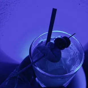 a blue lit cocktail