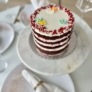Peppermint cake - devil&apos;s food chocolate cake with peppermint cream filling. Added flowers.