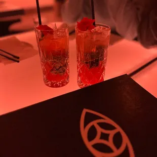 two cocktails on a table