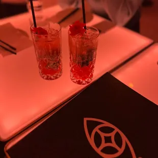 two cocktails on a table