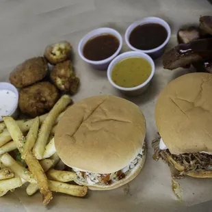 two burgers and french fries