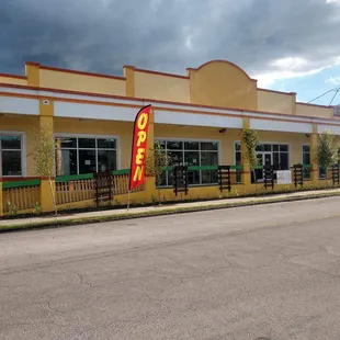 Y^es we are open as we continue to wait for our signage and other exterior features