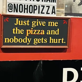a sign on the side of a building