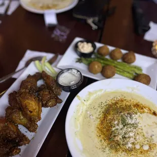 Honey old bay wings, cream of crab, and mini crab balls.