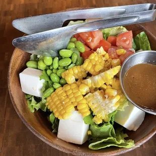 Nojo Salad-lettuce, corn, edamame, tomato and tofu with home made dressing on the side.