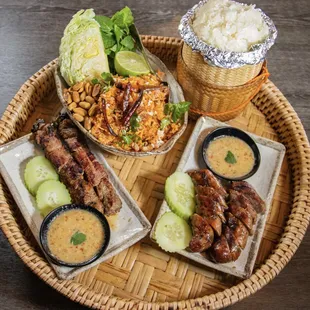 Combo Lao Sausage, Combo Ribeye Skewers and Nam Khao (crispy rice salad)