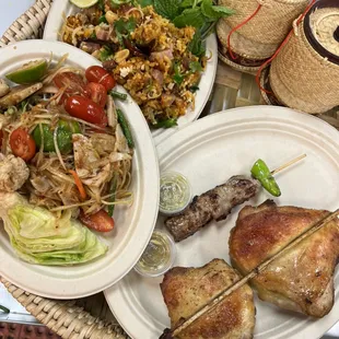 Combo3, ribeye skewer, papaya salad and crispy rice salad