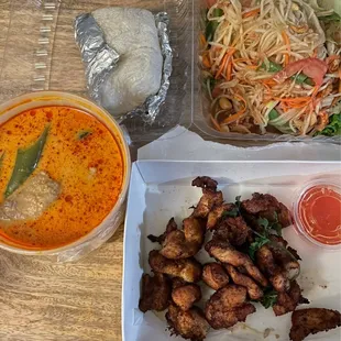 Penang curry, sticky rice, papaya salad, milk chicken
