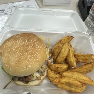 Blackened chicken sandwich with fries