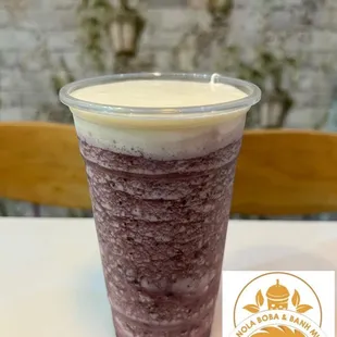 a smoothie in a plastic cup