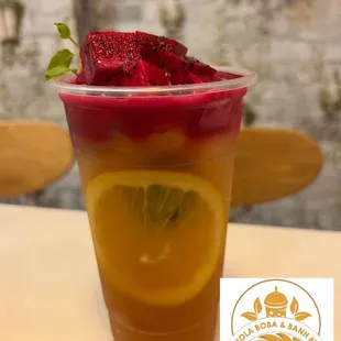 a plastic cup filled with fruit