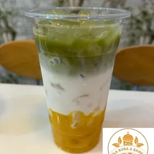 a cup of yogurt with fruit in it