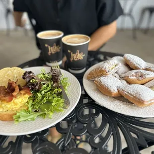 Beignet flight, egg scramble and caramel coffee.