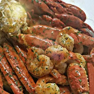 Boiled Seafood Platter: 1 Pound Snow Crab, Crawfish, Shrimp, corn, sausage and potatoes.