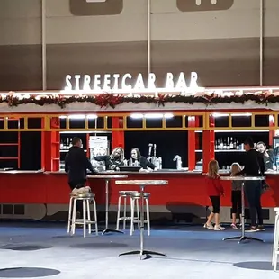 I love the Streetcar Bar and how it is located right inside to left of trees.