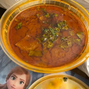 a bowl of soup and a bowl of soup