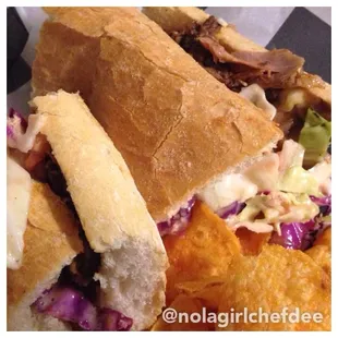 Barq's Root Beer Braised Pulled Pork dressed with Mardi Gras Slaw