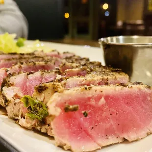 Perfectly seared Tuna Tartar with a wasabi cream sauce &amp; salad in gingery soy dressing.  Our fave we get it every time :)...