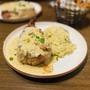 2 PORKCHOPS with &quot;Lafitte sauce&quot; Talked about this for a year! Had to come back &amp; have it again &amp; it was again off the CHAIN! :)...