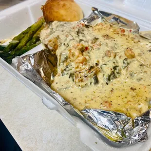The redfish with the crawfish sauce on top with asparagus is amazballs Get it! :)...