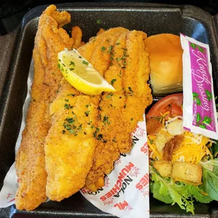 Fried Fish Platter served with fries, salad, and a roll
