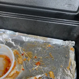 a half eaten meal in foil