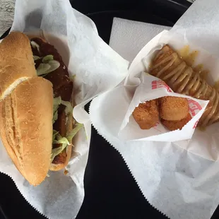 Sausage po boy and crawfish pie