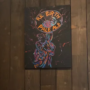 a poster on a wooden wall