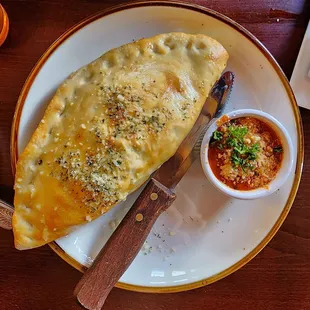 Sausage and cheese calzone - lunch for 11.00 and includes soup or salad.