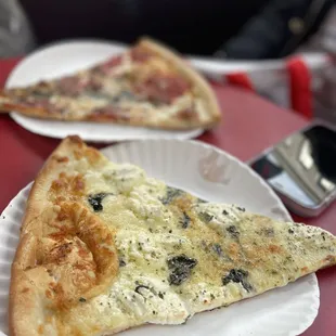 A white pizza slice