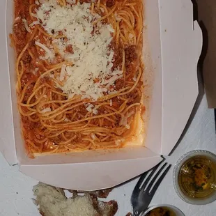 Spaghetti alla Bolognese with extra cheese, bread, olive oil...   buon cibo