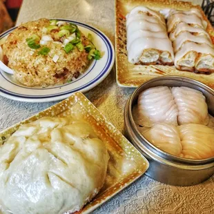 Sticky rice with BBQ pork buns, shrimp dumplings and Chinese doughnut wrapped in rice noodles
