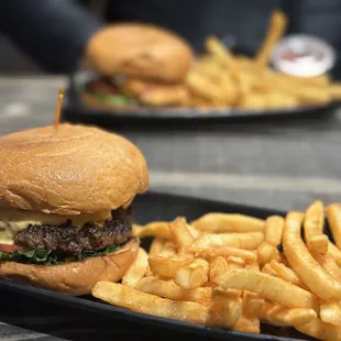 a burger and french fries on a plate