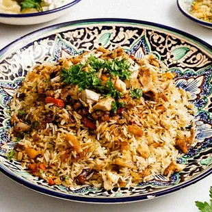 a plate of rice and vegetables