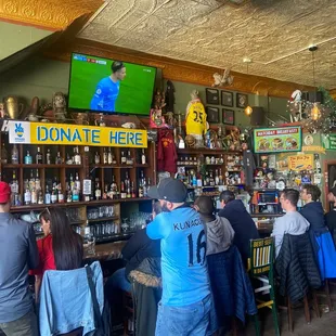 people sitting at the bar